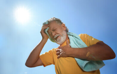 Senior man suffering from heat stroke