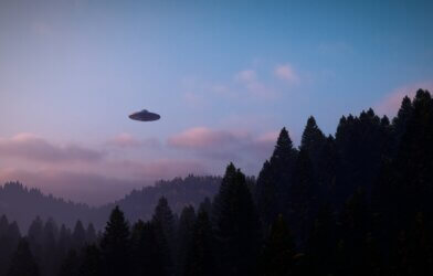 UFO hovering over the mountains