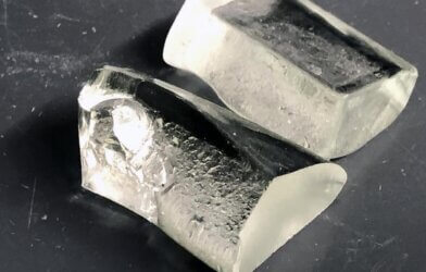 A sample of LionGlass, a new type of glass engineered by researchers at Penn State that requires significantly less energy to produce and is much more damage resistant than standard soda lime silicate glass.