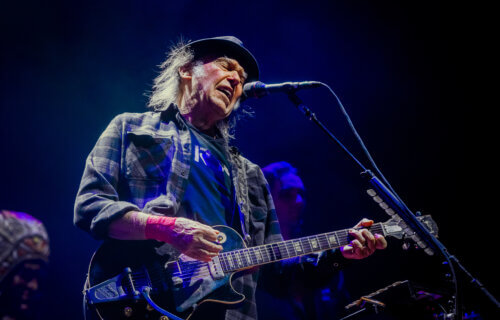 Neil Young performing in Amsterdam in 2019