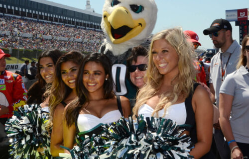 The Philadelphia Eagles NFL mascot and cheerleaders take part in pre-race ceremonies for the 2017 Axalta 400 at Pocono Raceway in Pennsylvania