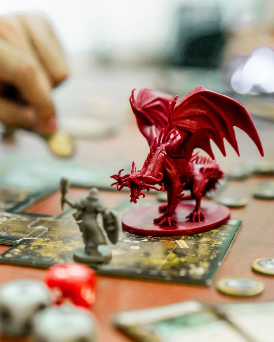 D&D with miniature game pieces Photo by Clint Bustrillos on Unsplash