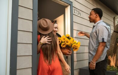 Greeting house guests at the front door
