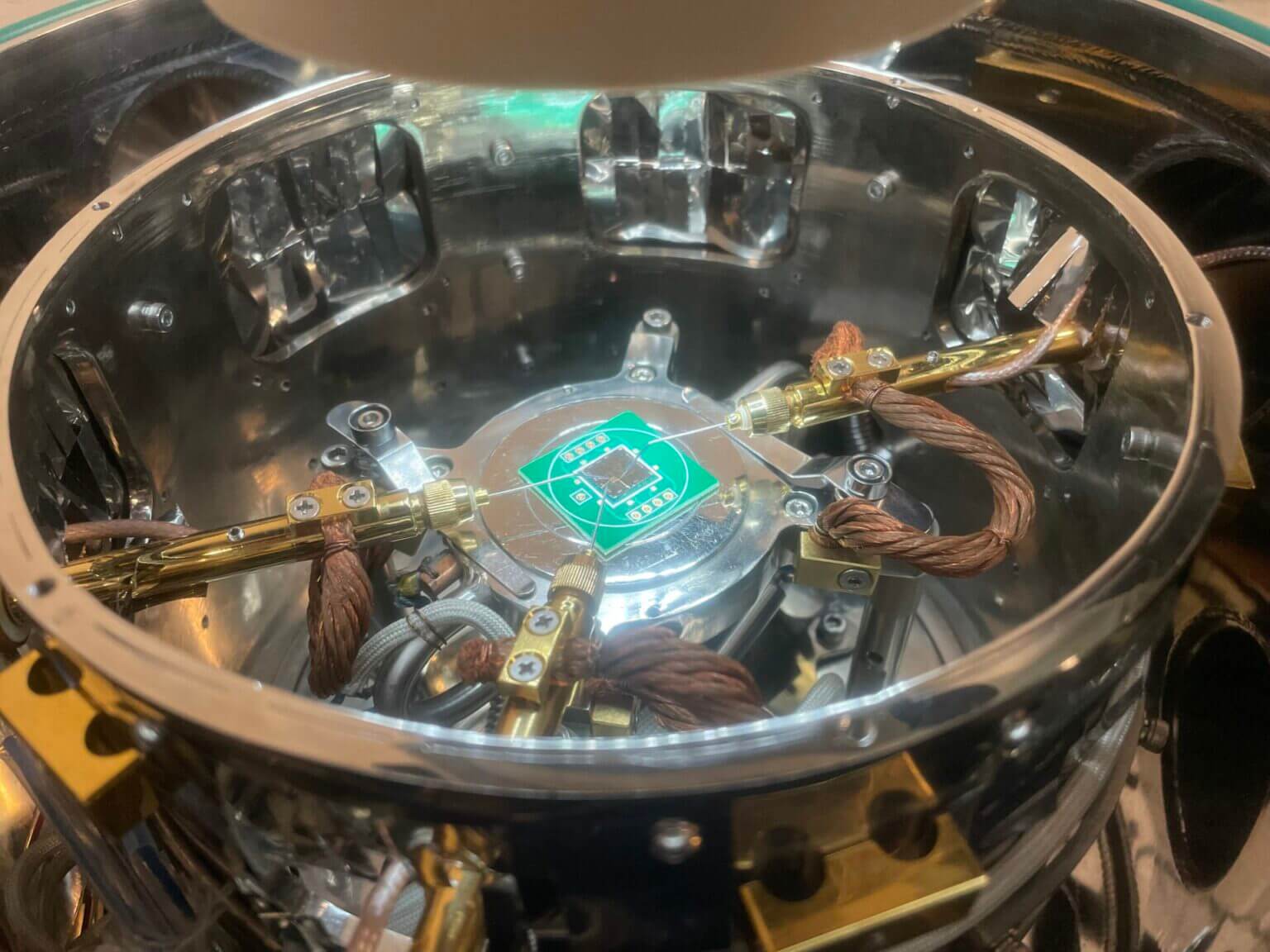 The team's ferroelectric neuromorphic computing chip, shown here undergoing testing in the lab.