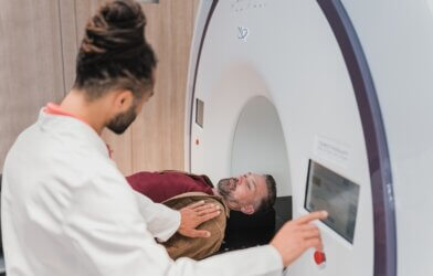 a doctor examining an MRI patient