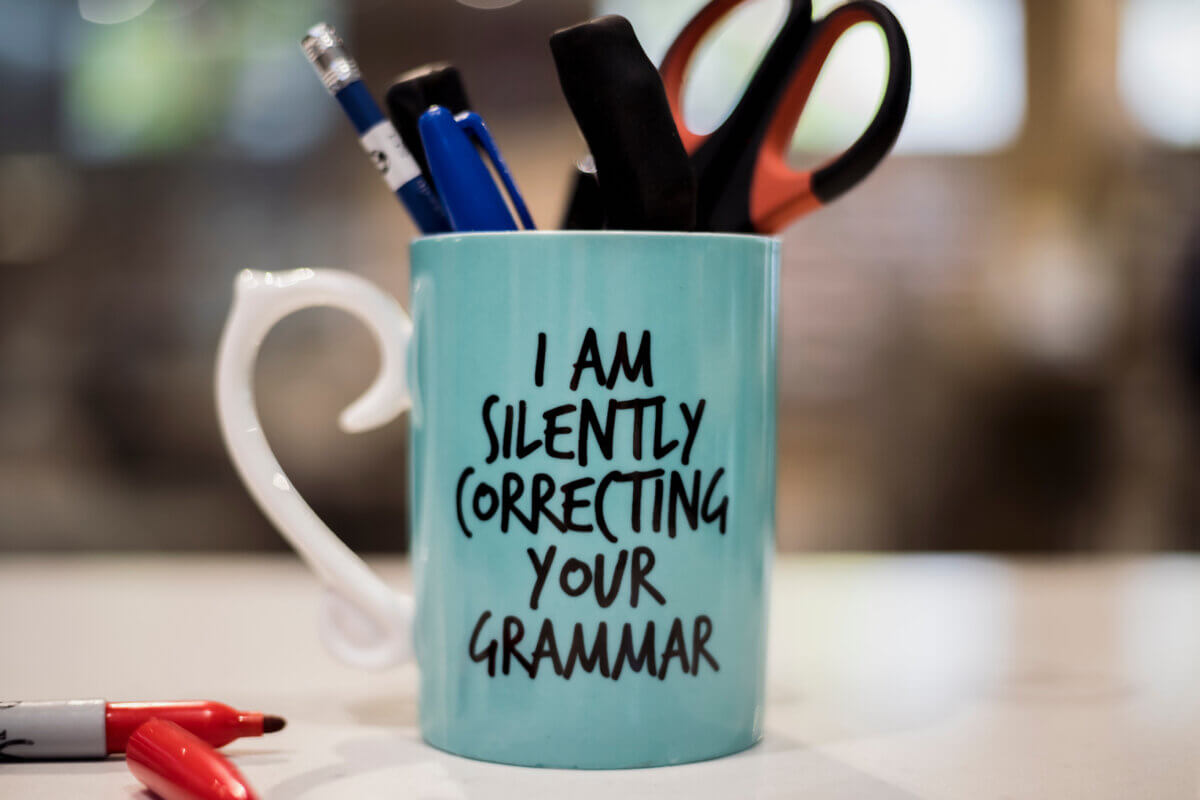 "I am silently correcting your grammar" coffee mug