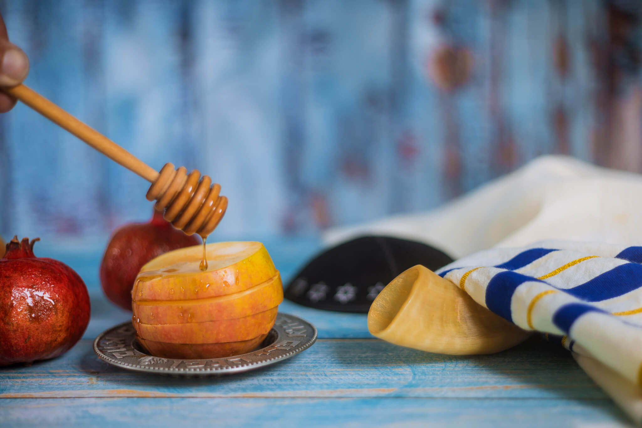 Jewish Rosh Hashana celebration featuring apples and honey