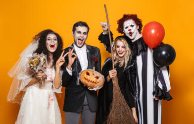 A group of people dressed in Halloween costumes