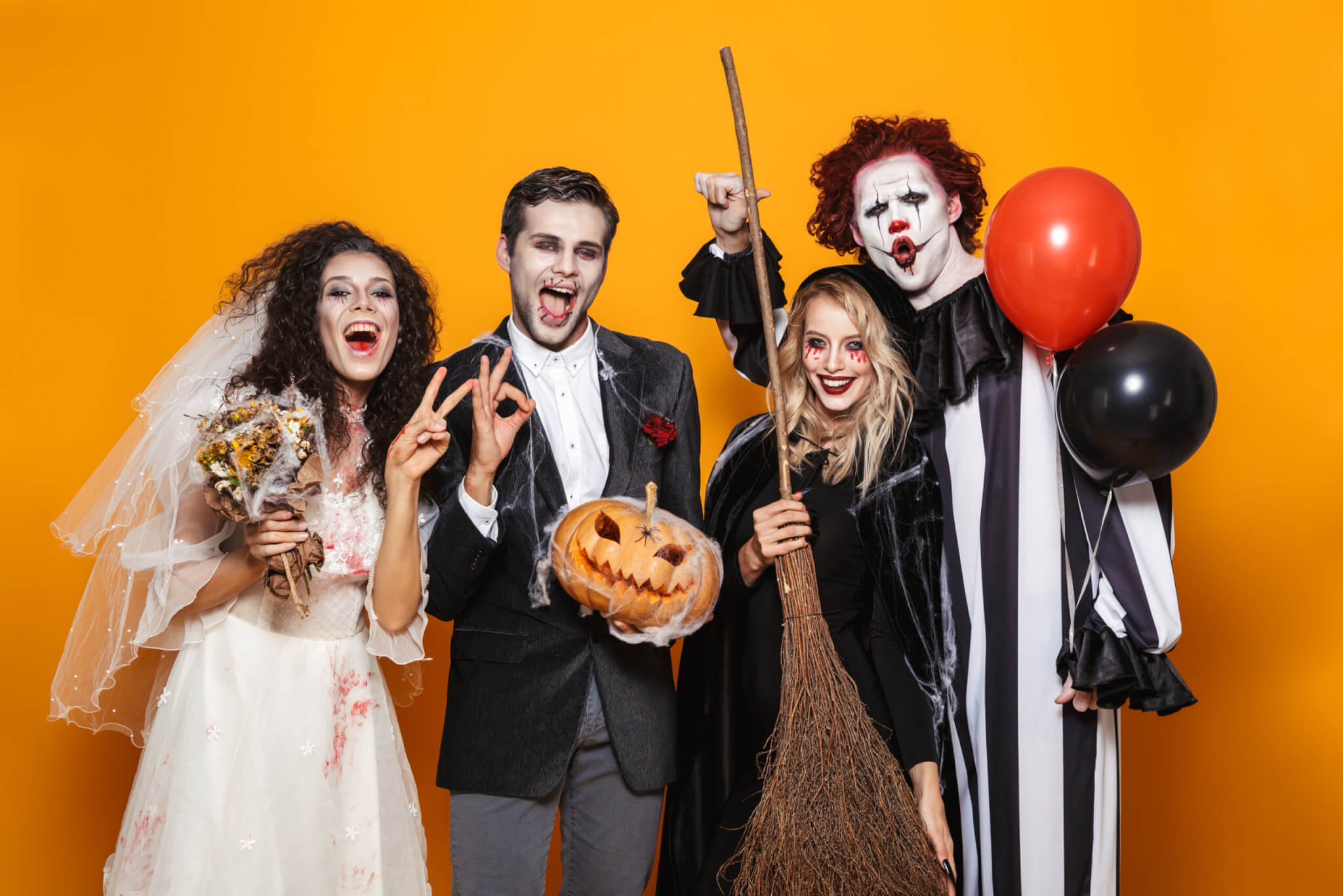 A group of people dressed in Halloween costumes