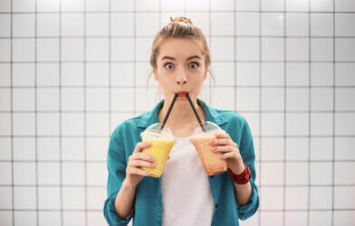 Young woman drinking smoothies