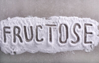Fructose word written in fructose powder