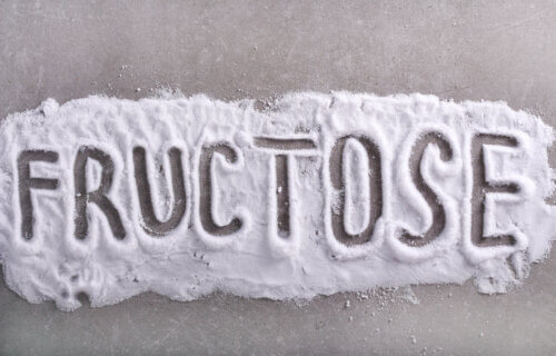 Fructose word written in fructose powder