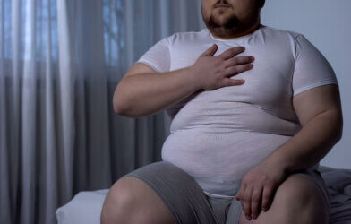 Obese male suffering from chest pain