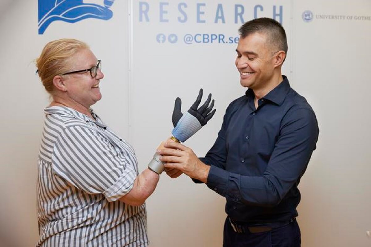 Karin with her integrated bionic hand and Prof. Max Ortiz Catalan