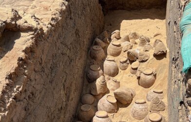 5,000-year-old wine jars in the tomb of Queen Meret-Neith in Abydos during the excavation. The jars are in their original context and some of them are still sealed.