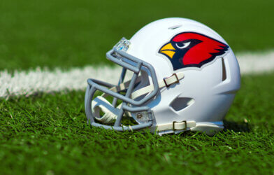 Arizona Cardinals replica helmet on a turf field
