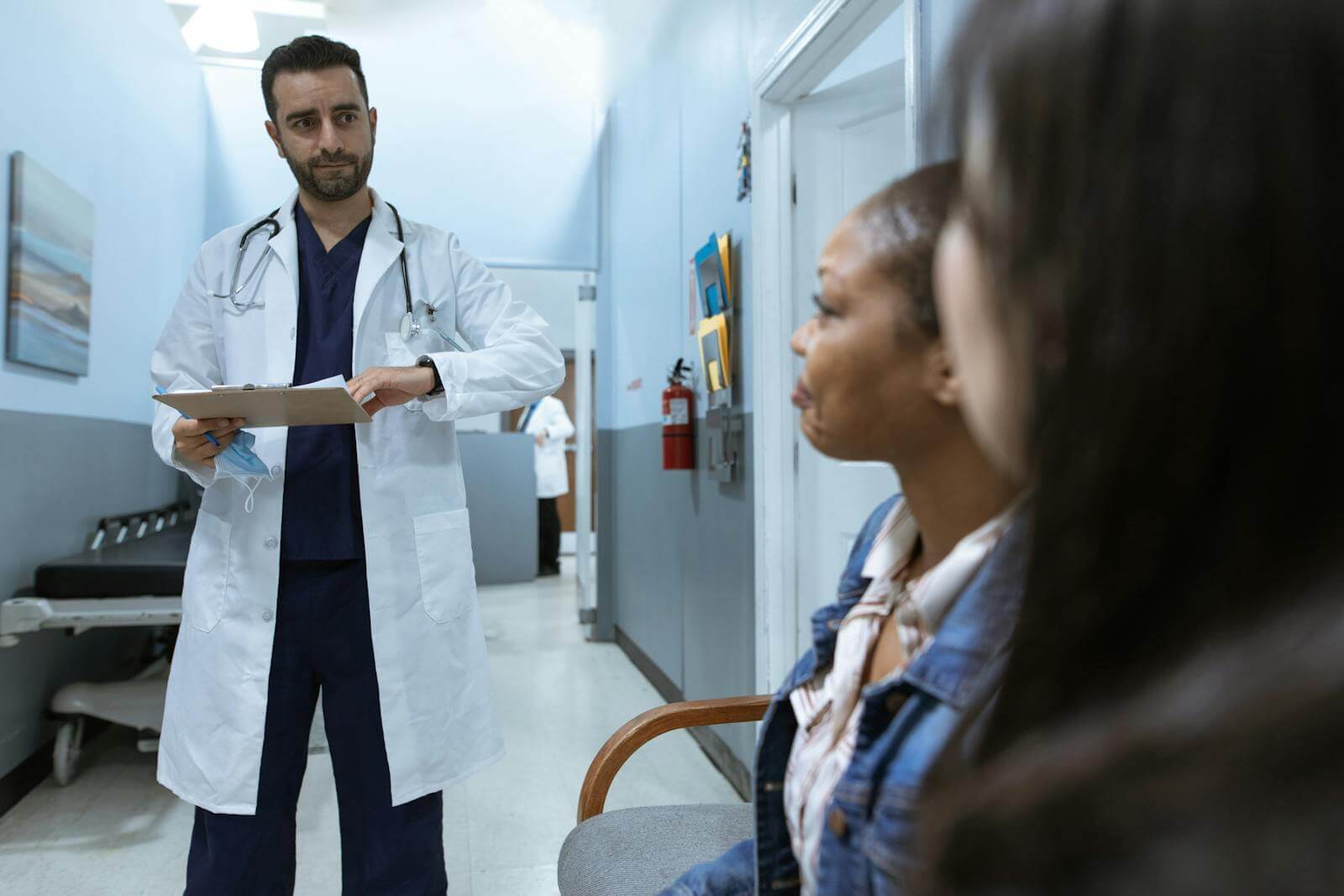 Doctor in White coat with patients