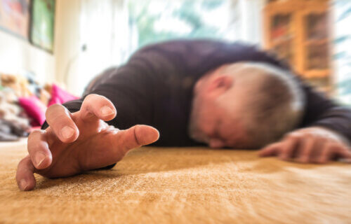 man on floor having a seizure