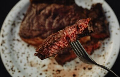 Closeup of steak on a fork