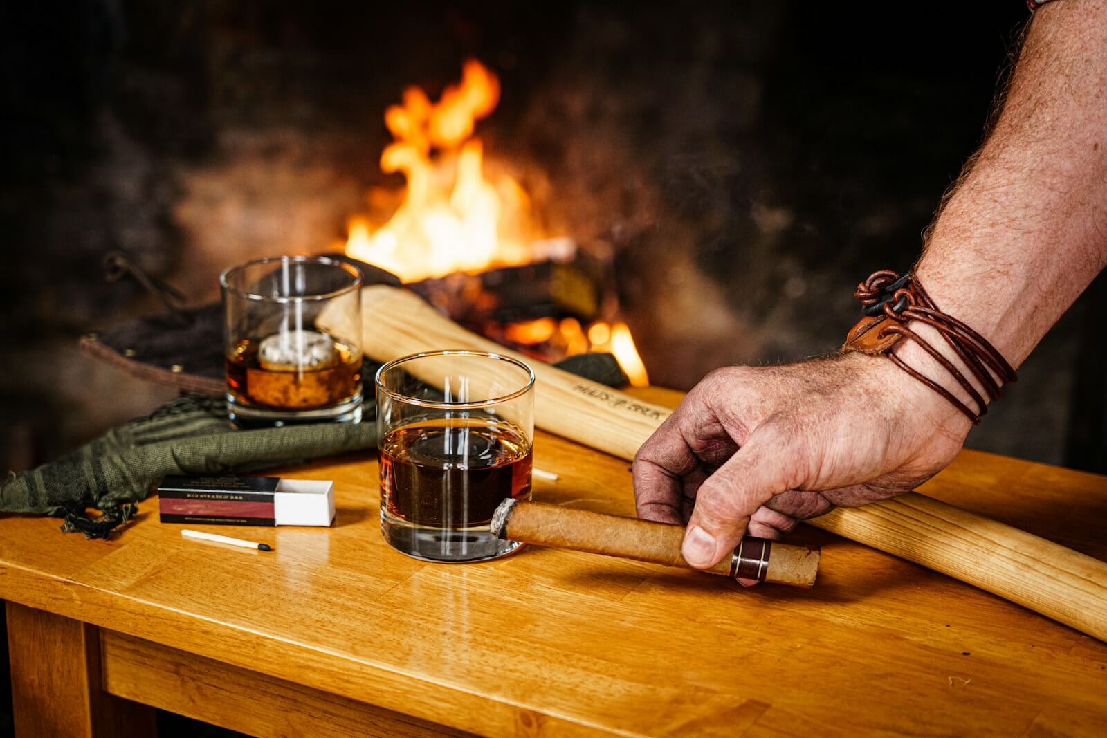 Cigar and cocktails by the fire