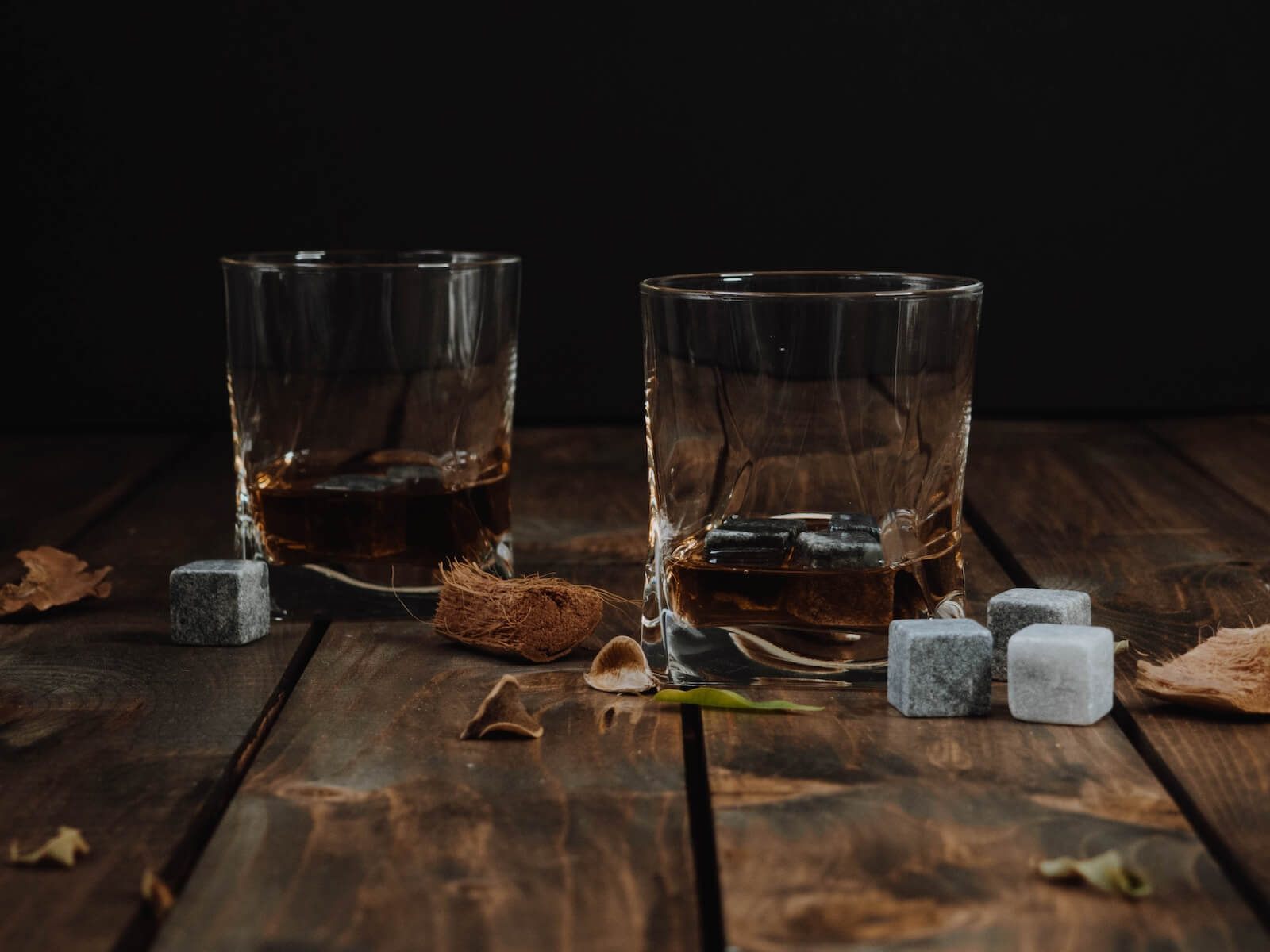Bourbon served neat in whiskey glasses photo by Anastasia Zhenina on Unsplash