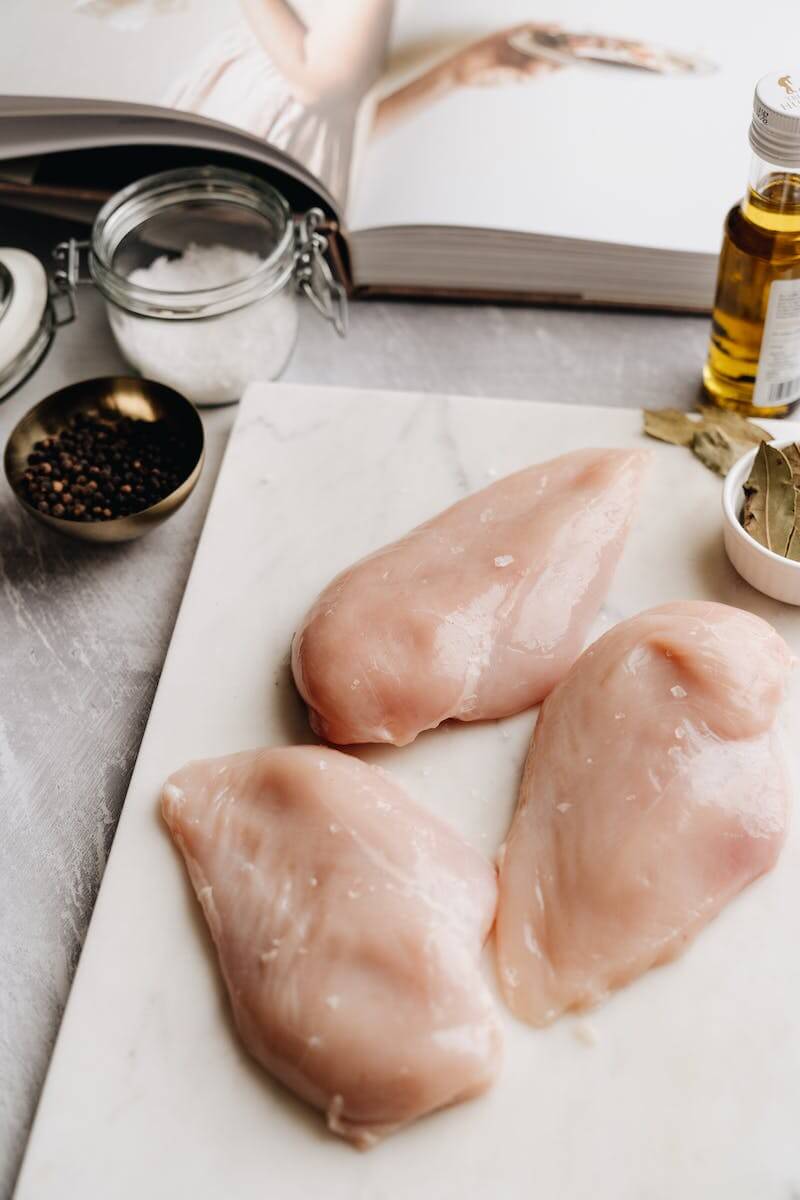 Chicken Breasts on a Chopping Board