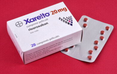 prescription drug box and pills of Xarelto