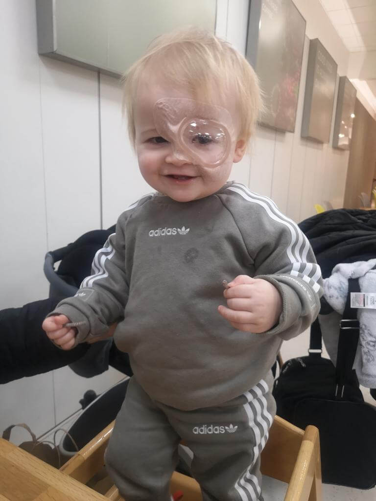 child with eye cancer