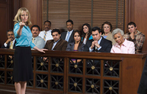 Prosecutor with jury in court