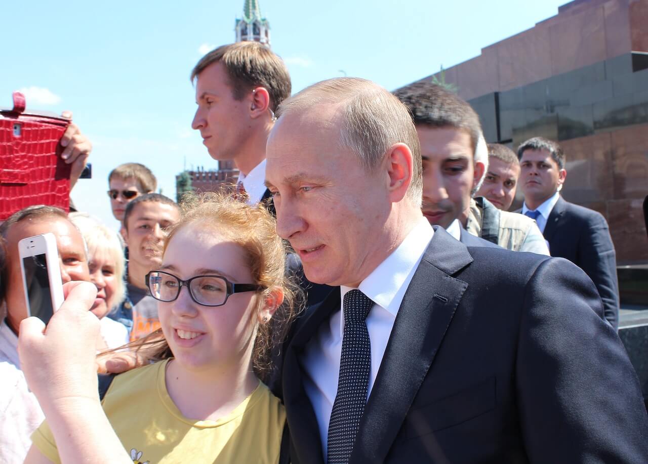 Putin posing with girl