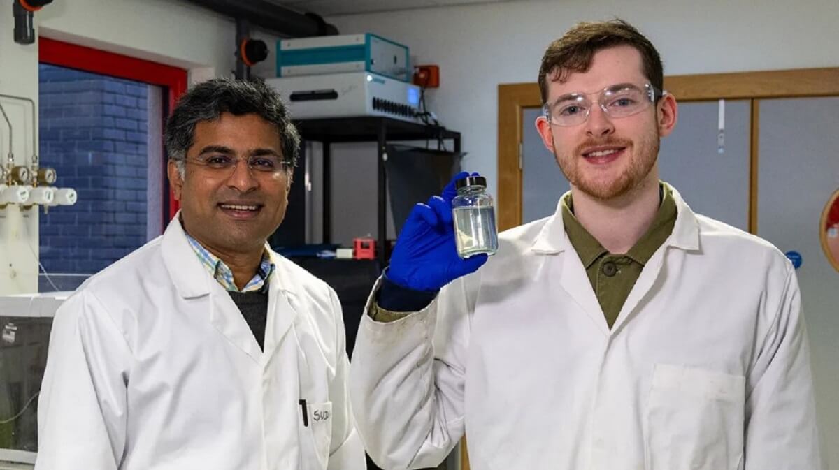 Heriot-Watt materials scientist Dr Sudhagar Pitchaimuthu (left) and PhD student Michael Walsh with a sample of whiskey distillery wastewater.
