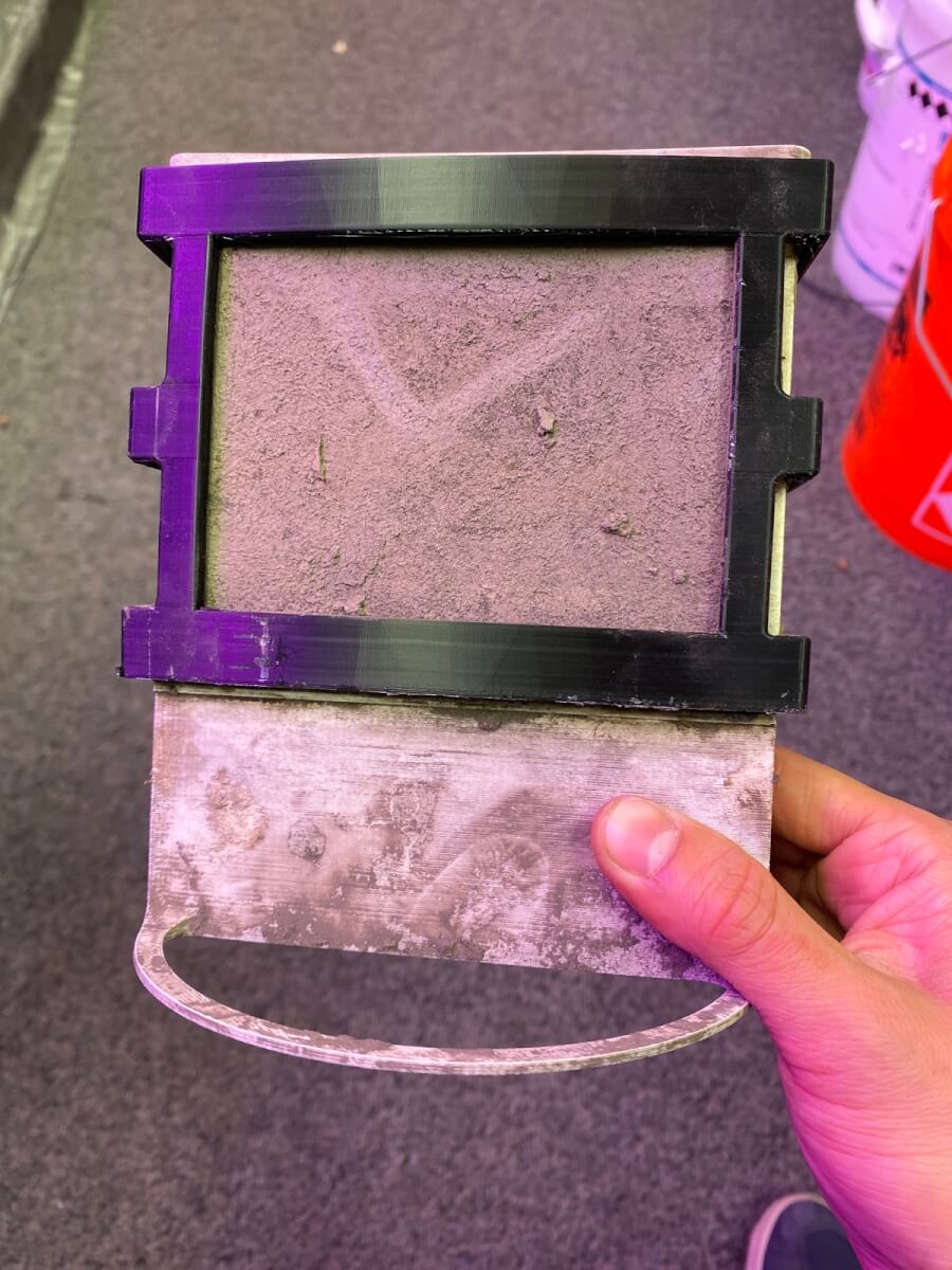 The fuel cell, coated in dirt after being pulled from the ground