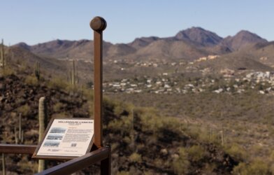 Jonathon Keats envisioned the Millennium Camera, seen here peering across the desert landscape toward the Star Pass neighborhood West of Tumamoc Hill in Tucson, to provide not only a record of the past for future humans but also to instigate discussion about what current humans can do to influence the future.