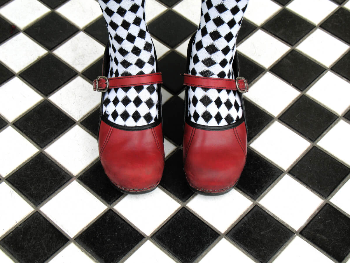 Red Mary Jane shoes with checkered tights