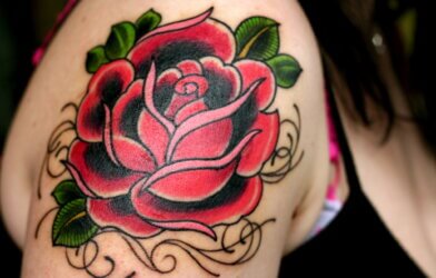 Rose tattoo on a woman's arm