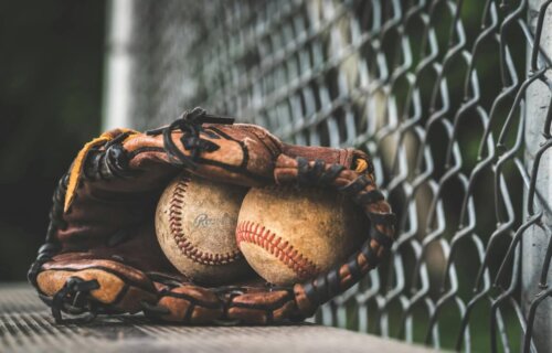 A Baseball Glove and Balls