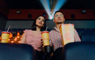 Couple watching a movie in the theater