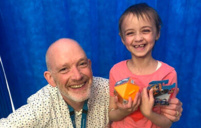 Professor Rob Wynn with Sarah, a young cancer patient