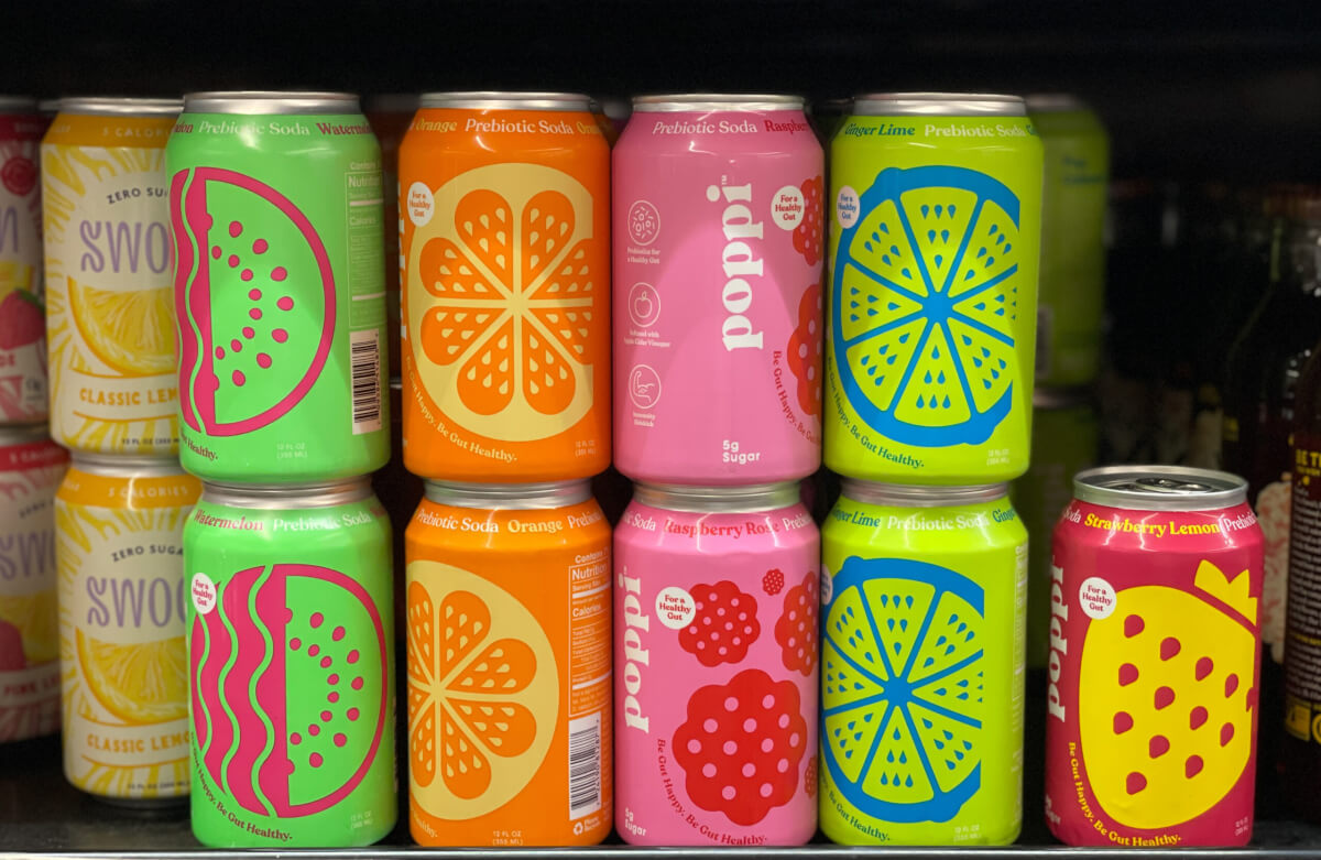 Variety of Poppi sparkling prebiotic soda on sale at Whole Foods.
