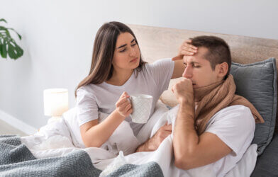 Woman taking care of her sick husband