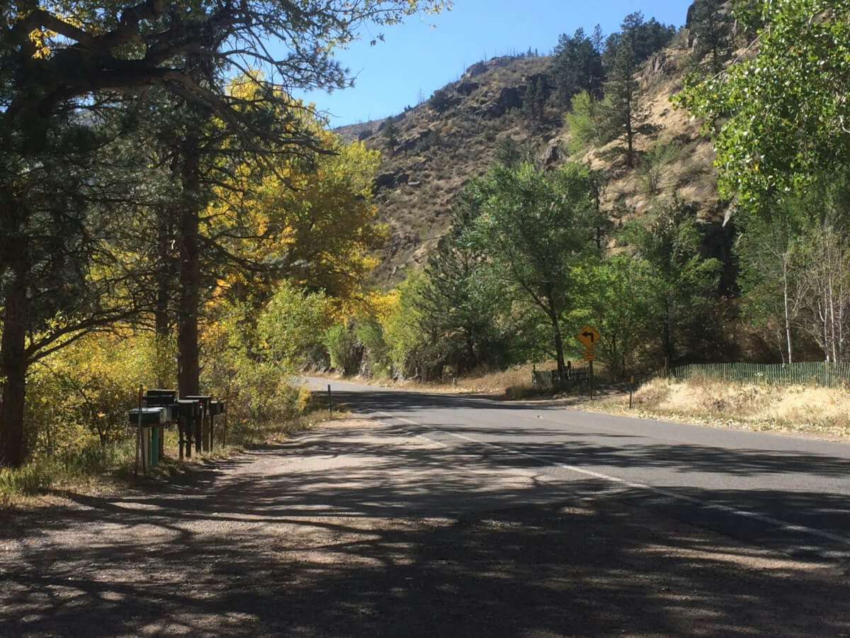 A shady road in Fort Collins, Colorado along the Poudre River