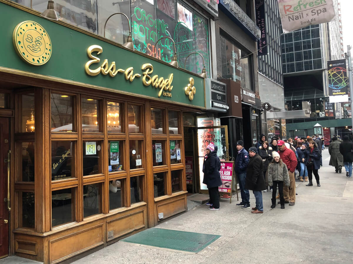 Customers lined up outside of Ess-a-Bagel in New York City