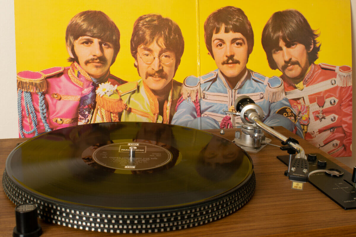 "Sgt. Pepper's Lonely Hearts Club Band" playing on a record player
