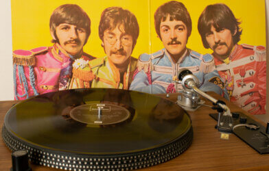 "Sgt. Pepper's Lonely Hearts Club Band" playing on a record player