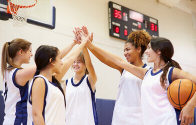 Female Basketball Team Having Team Talk