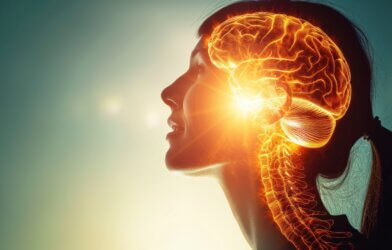 Profile of a woman with glowing brain illustration on a sunny background