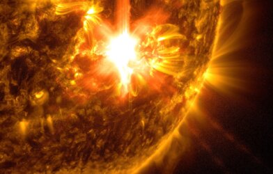 NASA’s Solar Dynamics Observatory captured this image of a solar flare – as seen in the bright flash toward the middle of the image – on May 10, 2024. The image shows a subset of extreme ultraviolet light that highlights the extremely hot material in flares and which is colorized in gold.