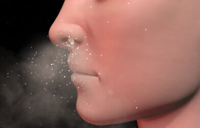 Human nose inhaling particles