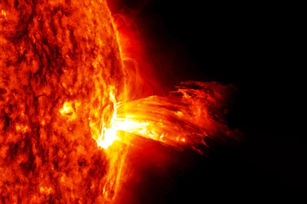 Depiction of solar storm erupting from Sun's surface.